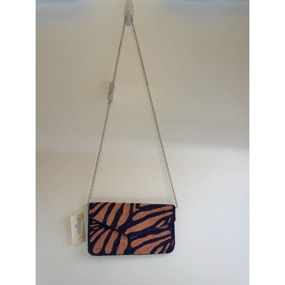 On 34th hand-beaded envelope clutch -navy and coral pink zebra stripe design